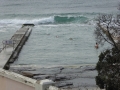 Wave breaking over Austinmer Ocean Pools