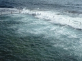 Waves breaking over Wylie's Baths at Coogee